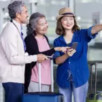 Family with children and luggage preparing for private transportation at SFO