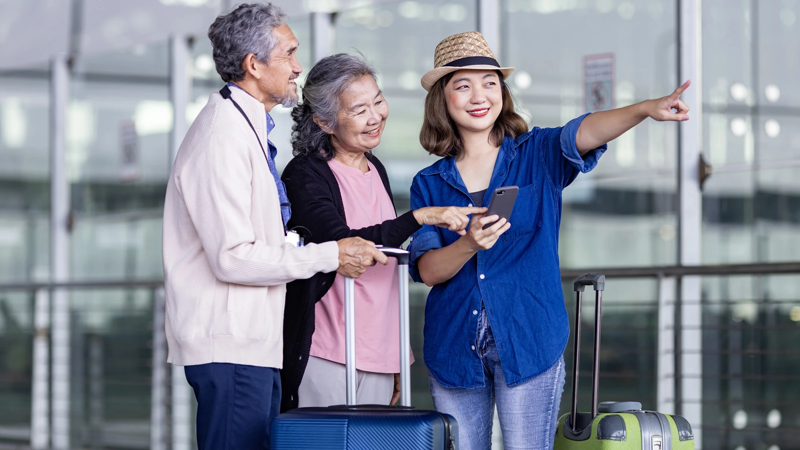 Family with children and luggage preparing for private transportation at SFO