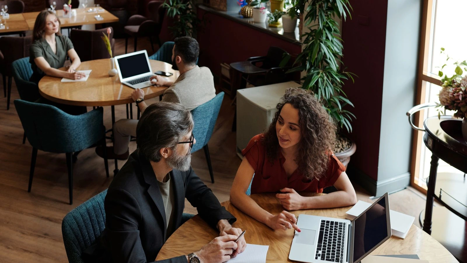 Business professionals meeting over dinner at a restaurant